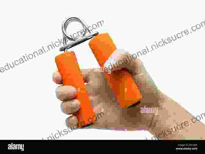 Close Up Of A Person Squeezing A Hand Grip Strengthener Hand And Forearm Exercises: Grip Strength Workout And Training Routine